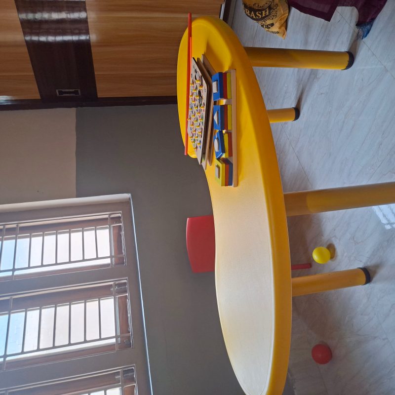 Creative corner with crayons and paper